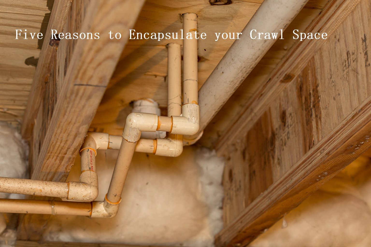 Old PVC plastic water supply pipes installed under house in craw