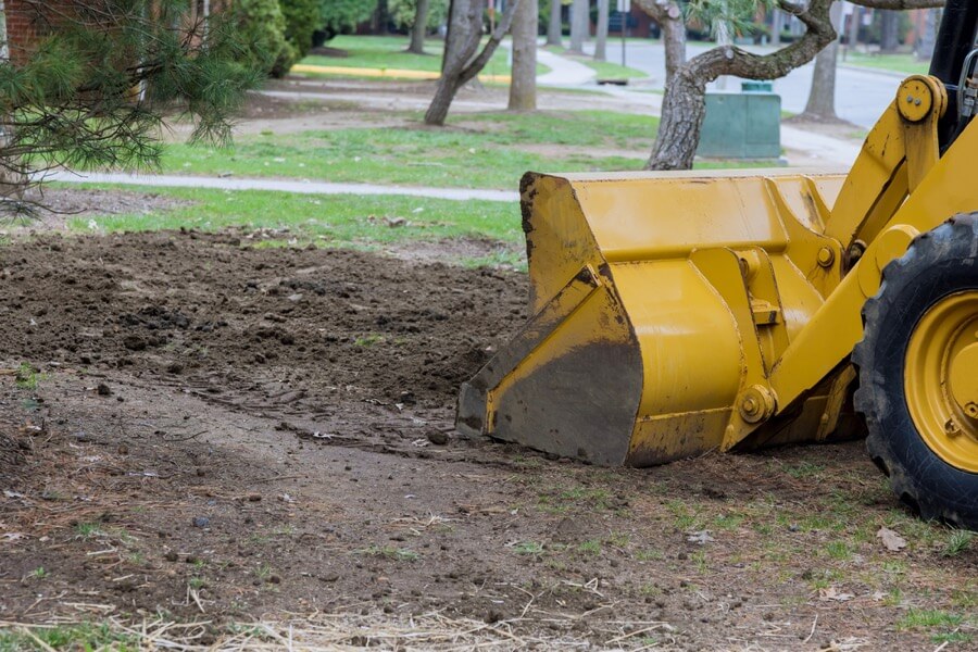 Foundation Leveling -tractor grading land